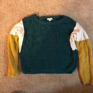 Green, white, and mustard yellow sweater